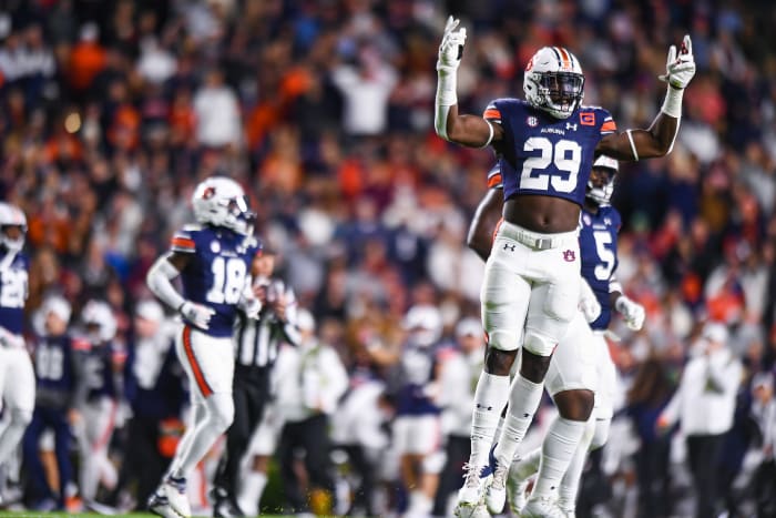 Derick Hall (29) pumps up the crowd during the game between Auburn and Texas A&M at Jordan-Hare Stadium. Grayson Belanger/AU Athletics